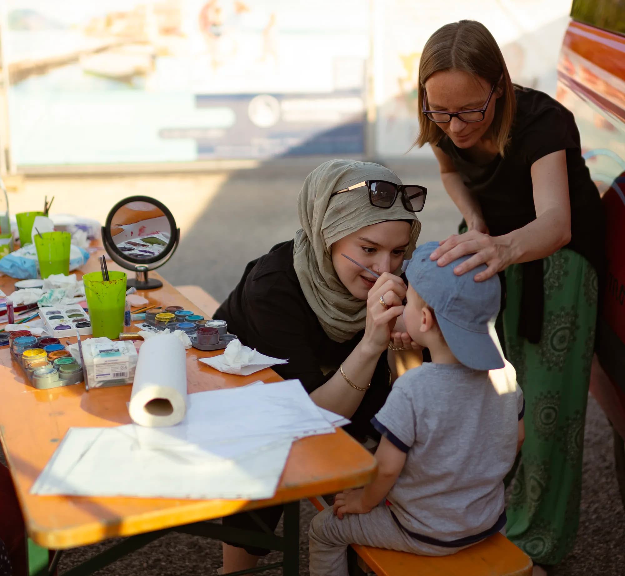 A lively scene inside the Kinderland children's tent with young visitors.