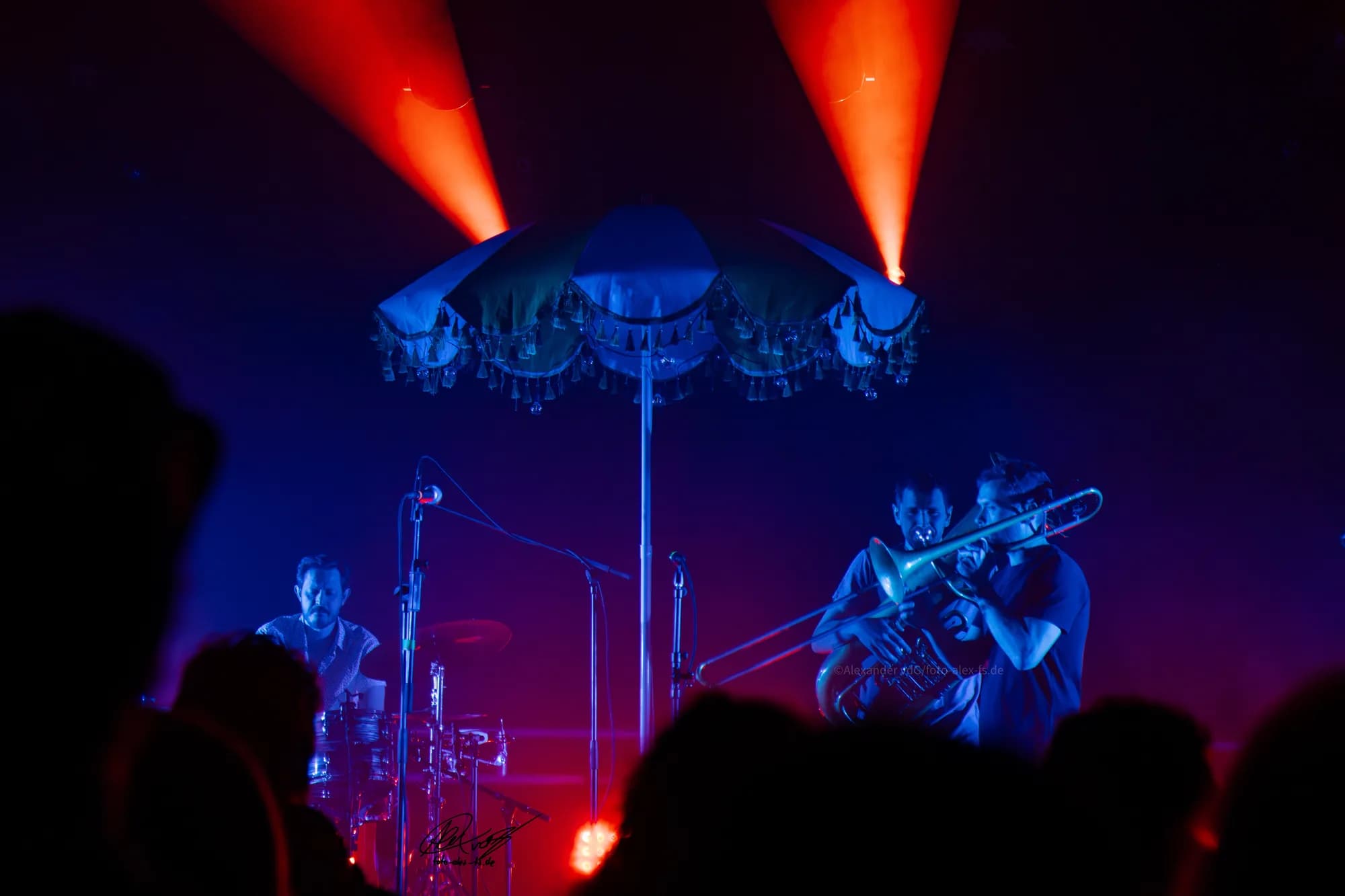 Singer Arms Raised Gold Tent